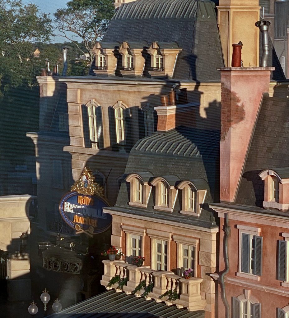 Remy's Ratatouille Adventure sign, as seen from the Skyliner.
<img decoding=